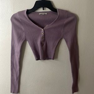 Beautiful soft purple cropped long sleeve. Can button all the way or half way.